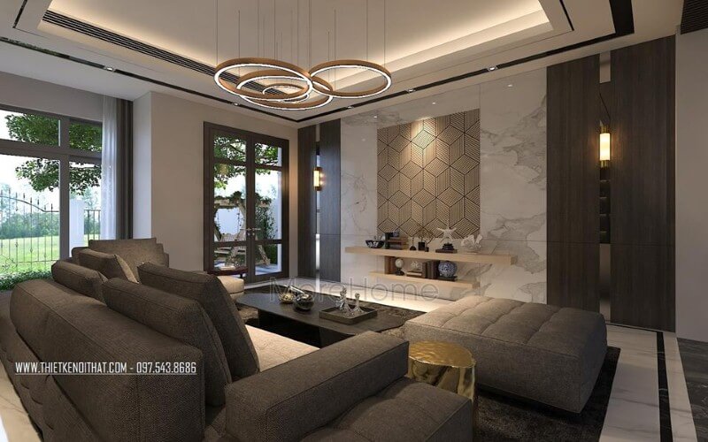 Trang trí không gian phòng khách rộng, hiện đại ấn tượng với ý tưởng sử dụng gam màu đối lập từ xám trắng cùng đồ nội thất cao cấp. thiết kế biệt thự