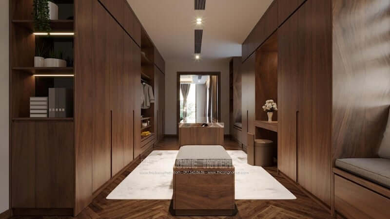 Mẫu thiết kế tủ quần áo gỗ đẹp sử dụng gỗ óc chó nhập khẩu màu nâu trầm với những đường lôi cuốn mang đến không gian phòng thay đồ đẳng cấp cho gia chủ Mẫu tủ quần áo biệt thự cho phòng ngủ