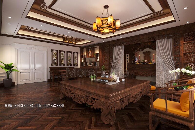 Thiết kế nội thất phòng thờ sang trọng với phong cách gỗ Việt, ngay liền kề được bố trí thêm chiếc sập cùng màu tạo sự thuận tiện cho gia chủ trong quá trình thờ cúng gia tiên Phòng thờ biệt thự