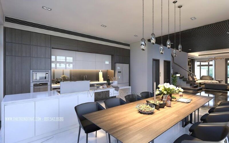 Bố trí nội thất phòng ăn liền bếp hiện đại, đẹp từ tủ bếp đảo kết hợp đá ốp cao cấp cùng bộ bàn ghế ăn gỗ nguyên tấm độc đáo.