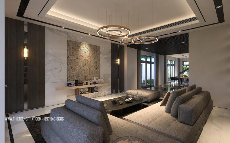 Đá kết hợp cùng gỗ ốp tường là một trong những xu hướng ấn tượng trong trang trí phòng khách hiện đại, cao cấp. thiết kế biệt thự