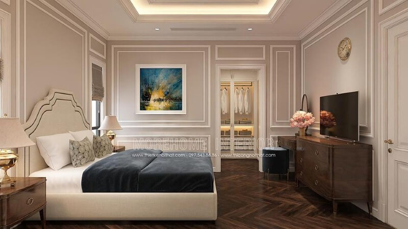 Thiết kế nội thất phòng ngủ tân cổ điển nhẹ nhàng, sang trọng với giường bọc nệm trắng, kệ tivi gỗ óc chó cao cấp. thiết kế biệt thự tân cổ điển