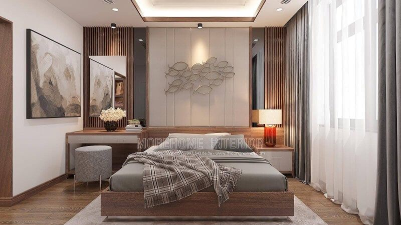 Thiết kế phòng ngủ nam tính với những đường nét vuông vắn khỏe khoắn từ giường ngủ hiện đại, kệ trang trí đến các đường kẻ sọc trang trí mảng tường, hay ngay cả gương trang trí đều tạo nên vẻ đẹp cứng rắn độc đáo. Tuy nhiên những đường nét mềm mại làm điểm nhân từ hình ảnh đàn cá hay bức tranh canvas treo tường nghệ thuật sẽ là một gợi ý dung hòa ấn tượng thổi hồn trong phong cách sống chủ nhân.