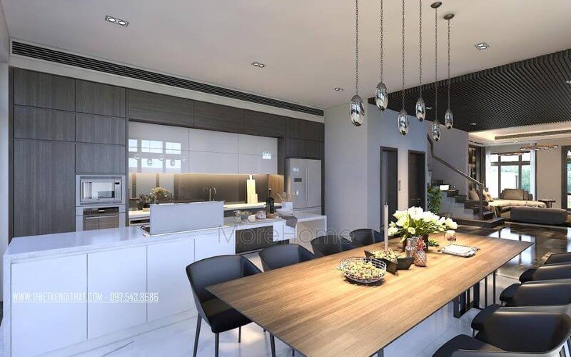 Trang trí nội thất phòng ăn liền bếp hiện đại, sang trọng từ tủ bếp đảo kết hợp đá ốp cao cấp cùng bộ bàn ghế ăn gỗ nguyên tấm độc đáo.